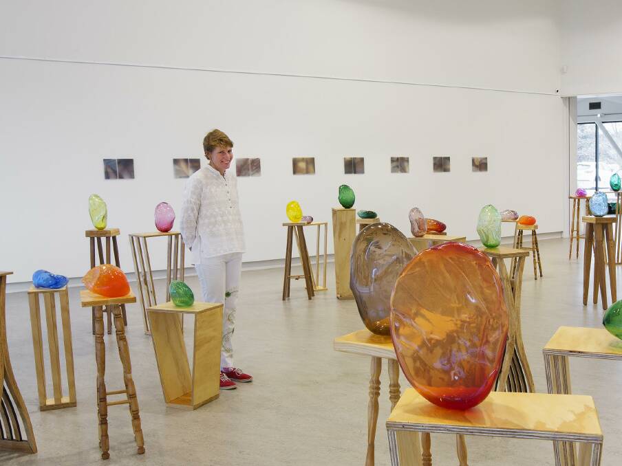 GLASS ART: Catherine Newton with her graduating works which will feature in an upcoming exhibition at the Orange Regional Gallery. Photo: MONICA STYLES