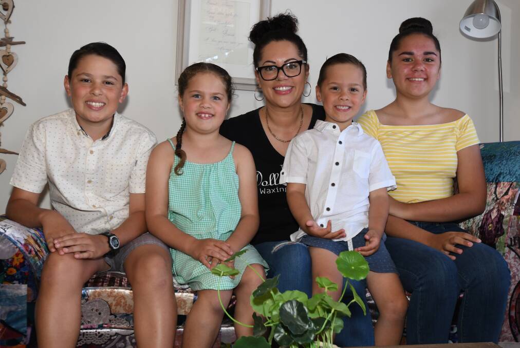 BOSS MUM: Even with her four kids, Kobi, Lahni, Jayce and Jade Nayler at school, Nancy said it's a juggling act. Photo: CARLA FREEDMAN
