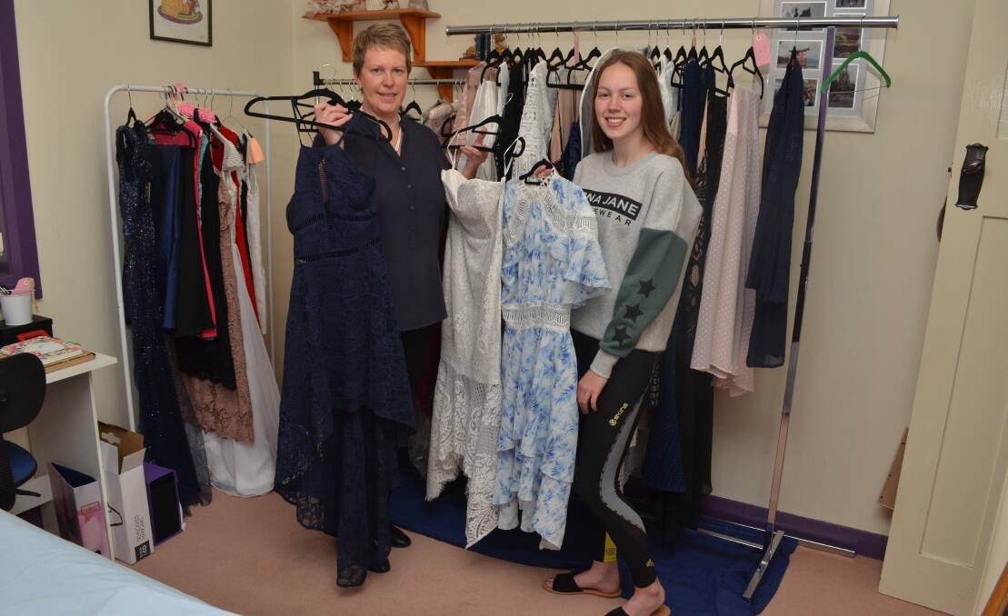 FORMAL WEAR: Sharon Cole and Maddie Cole have launched an online rental business for formal wear. Photo: ALEX CROWE 0310acformalwear1
