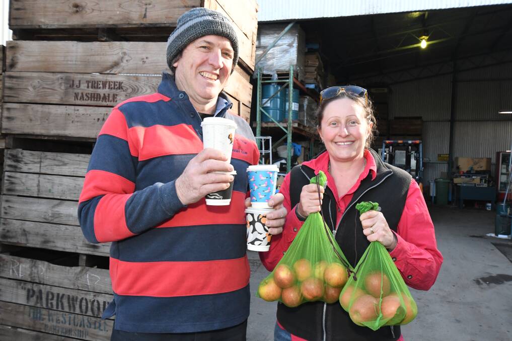 PLASTIC FREE: Walkabout Coffee's Scott Dowling and Thornbrook Orchard's Paula Charnock are Orange Farmers Market stallholders who have pledged to reduce plastic waste. Photo: JUDE KEOGH