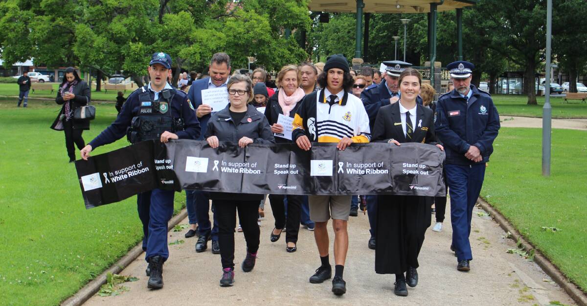 MARCH AHEAD: Senior Constable Granton Smith, Penny Dordoy, Cain Selwood and Lucy Johnston lead the walk. 