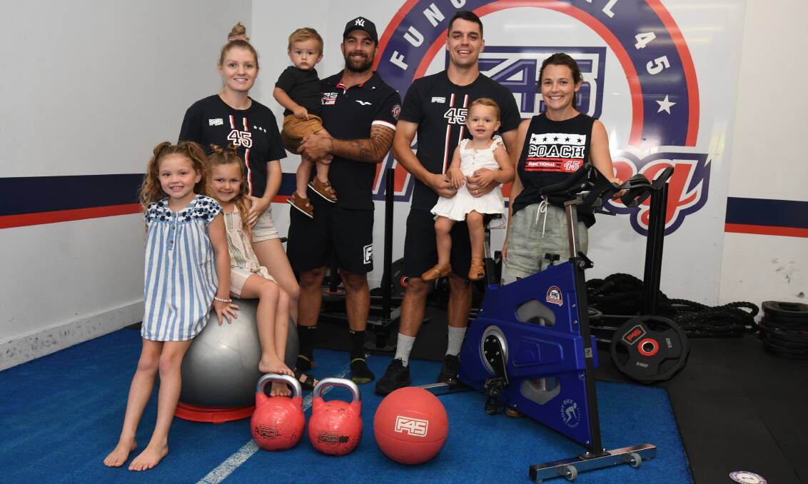 FIT FAMILIES: Bo, Lotti, Hannah, Willie and Jared Brodrick alongside Sam, Finnella and Abbi Powell will take over the F45 franchise on Peisley Street next month. Photo: JUDE KEOGH