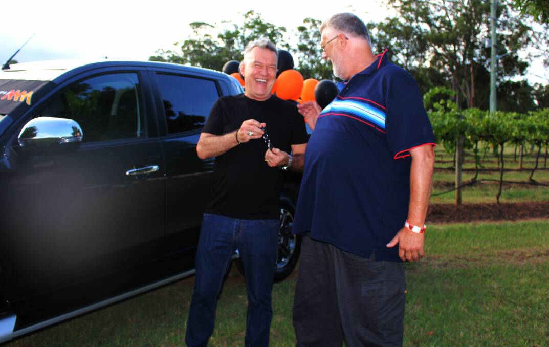 BIG WIN: Rock legend Jimmy Barnes handed the keys to a new truck over to Alex Van Den Bos at the Hunter Valley concert on the weekend. Photo: supplied
