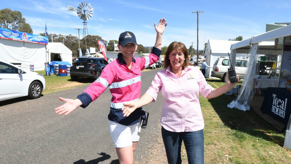 GATES OPEN: Australian National Field Days organisers Bree McMinn and Jayne West are geared up for a busy three days at Borenore. Photo: JUDE KEOGH 1024jkfield1