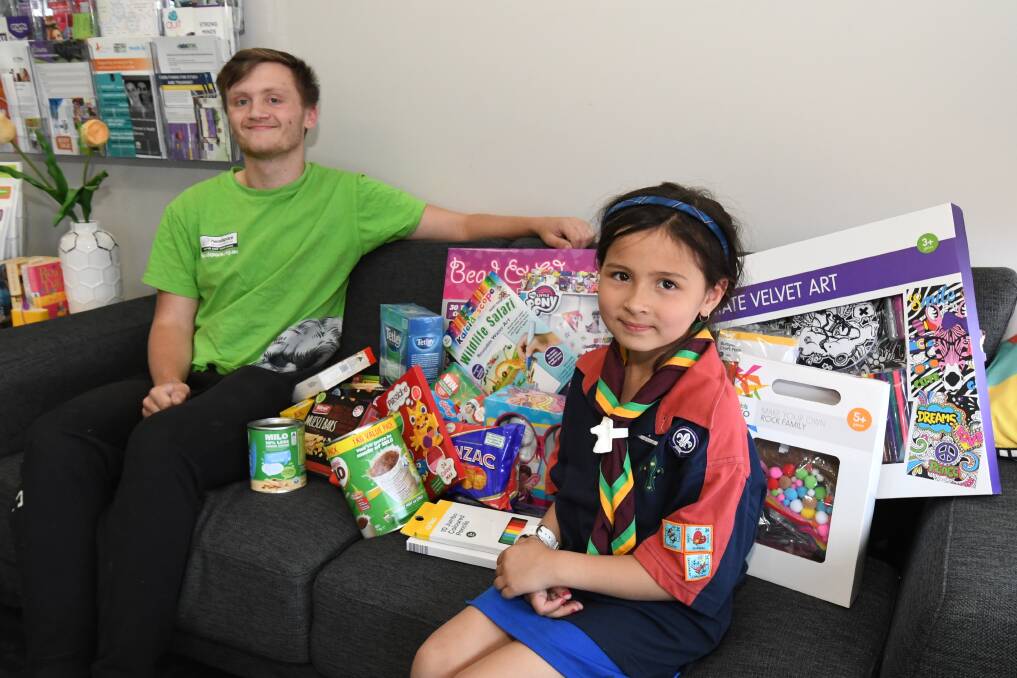 DONATION DAY: headspace Youth Reference Group's Torren Burton with 3rd Orange Scout Alexia Stevens at headspace Orange. Photo: JUDE KEOGH