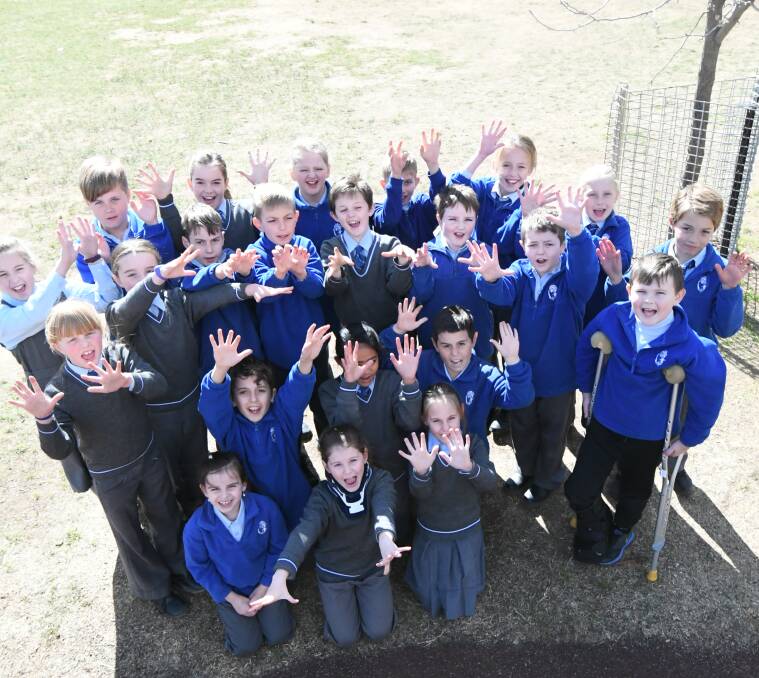 READY TO ROCK: Calare Public School's 'Four Blue' class is ready to wow audiences with its speaking poetry skills when it takes the eisteddfod stage next week. Photo: JUDE KEOGH 0801jkcalare3