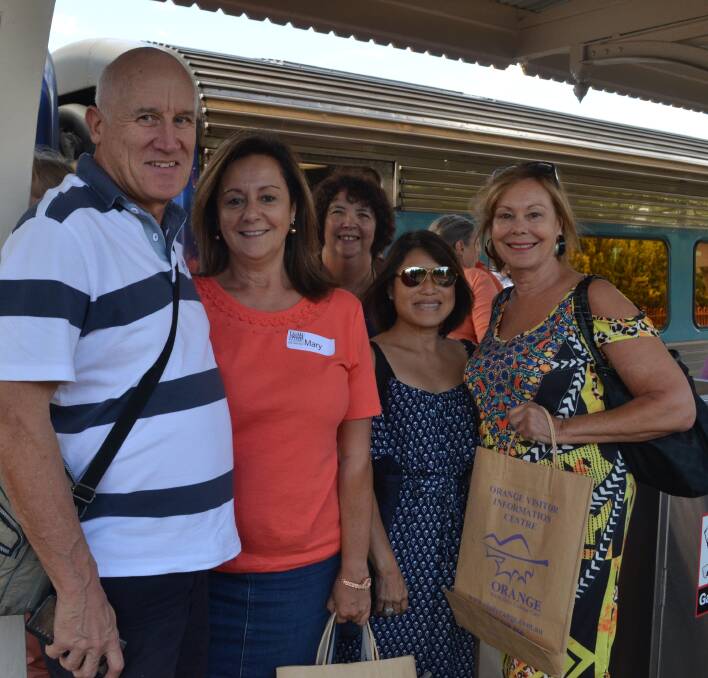 FOOD EXPRESS: Stewart Whitelaw, Mary Dimech, Sally McClure, Vivien Lim and Deb Deller stepping off the FOOD train from Sydney on Friday for a weekend of fine dining festivities which include Forage and lunch at Lolli Redini. 