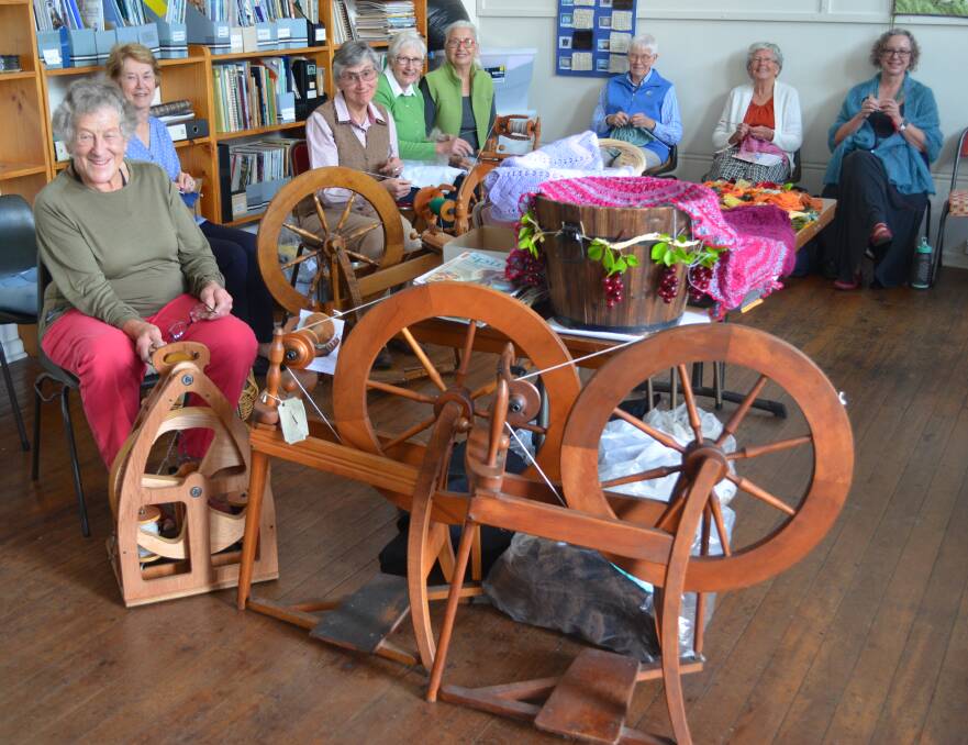 SPINNERS: Susan Sanders, Kay Richard, Patricia Bannatyne, Rosalie Neville, Glenys Logan, Isobel Holcombe, Eileen Preller, Clivia Frieden meet once a week to catch up and create. Photo: ALEX CROWE 0419acspinners