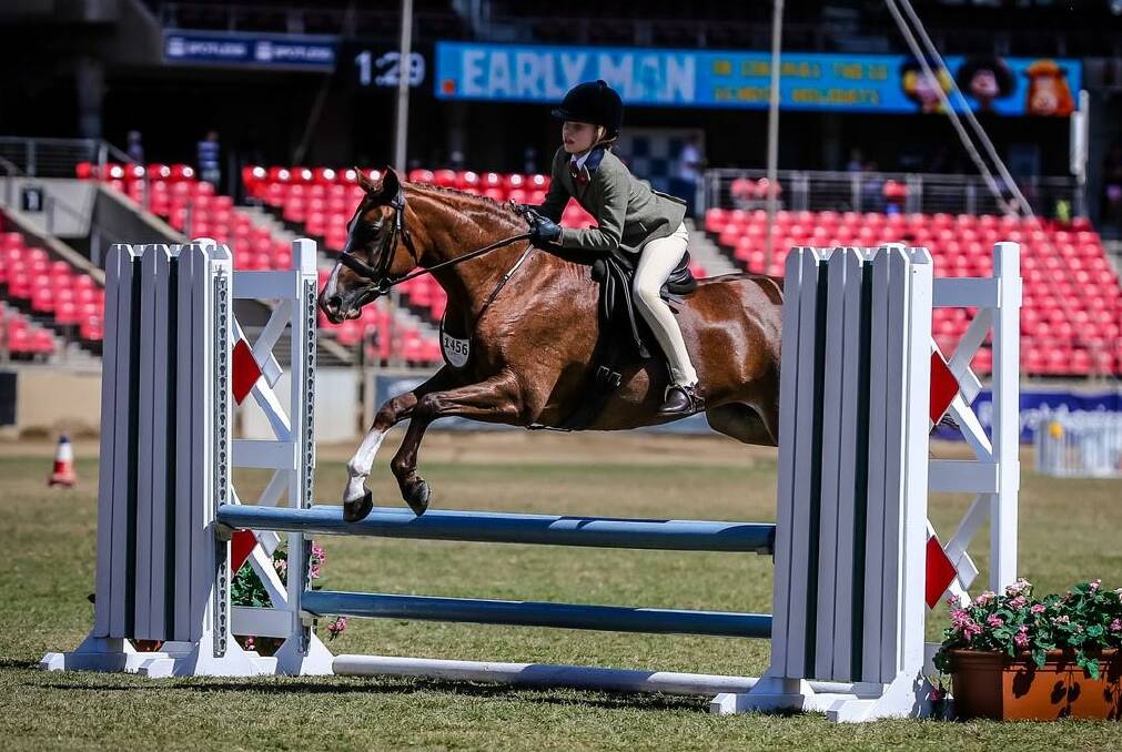 EQUESTRIAN STAR: Darcey Eyb represented James Sheahan Catholic High School in show riding at the Sydney International Equestrian Centre earlier this month. Photo: LORELLE MERCER