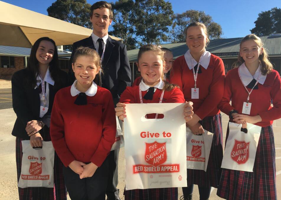 SCHOOL SUPPORT: Orange Christian School's Taylah Reilly, Harriet Grounds, Addison Toms, Hannah Reilly, Olivia Buckerfield, Lydelle Toms and Georgie Taberner. Photo: ALEX CROWE