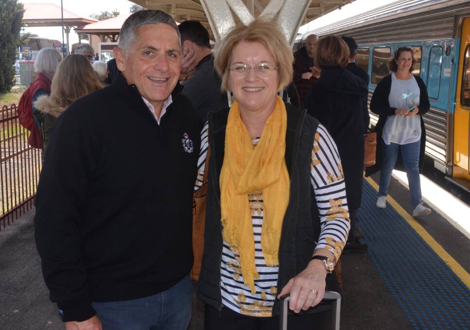 WINE TIME: Bruce and Lisa Gelsomino step off the train to start their three-day food and wine journey around Orange. Photo: ALEX CROWE 