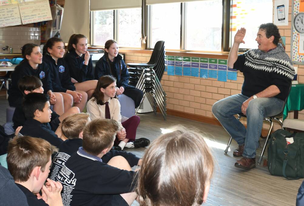 FUN AT SCHOOL: Marco Gliori entertained St Mary's students last year thanks to the Rotary Club's successful funding application. Photo: CARLA FREEDMAN 0813cfbushpoet5