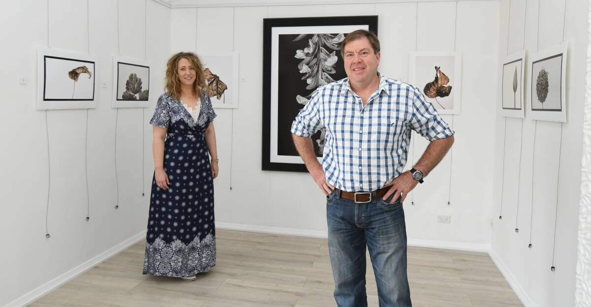 FLOWER SHOW: Gallery owner Leiarna Dunworth and Scott Gilbank at the Peisley Street Gallery ahead of Thursday's launch. Photo: JUDE KEOGH.
