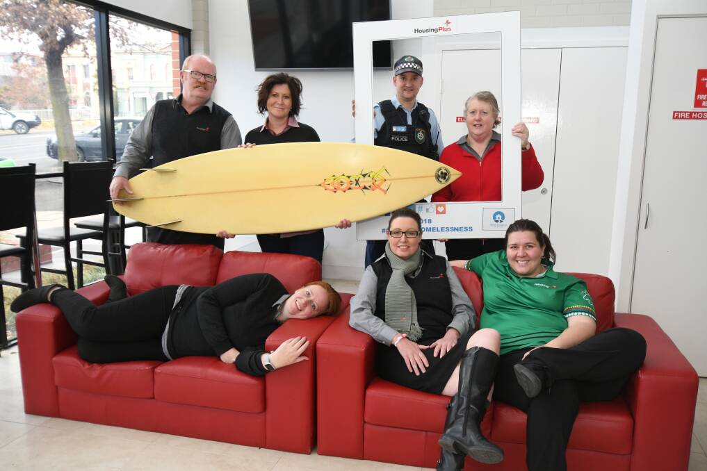 COUCH SURFERS: Housing Plus' Darren Hunter, Fiona Lindsay, Snr Const Granton Smith, Toni Parker, Sarah Miller, Sam Maggs and Nicole Gouge. Photo: JUDE KEOGH 0808jkhousing1