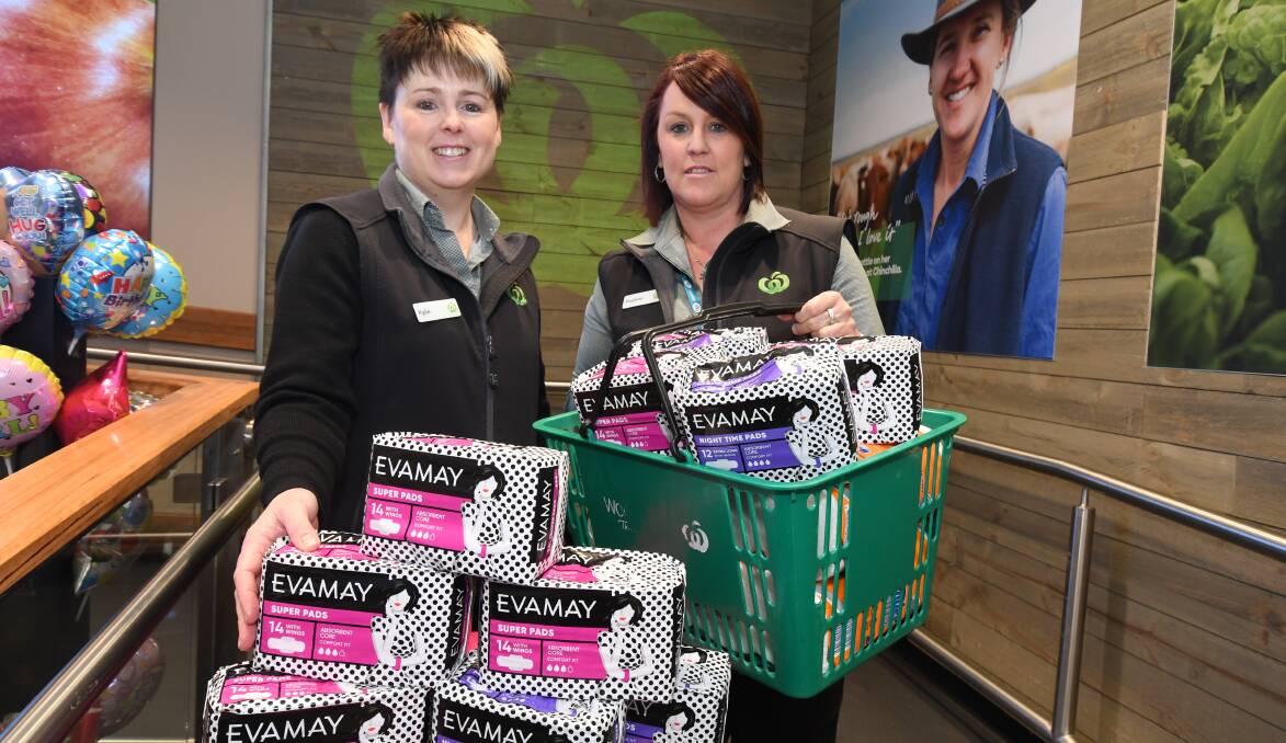 DIGNITY DONATIONS: Woolworths supermarket employees Kylie Toholke and Raylene Harvey during the donation collection this week. Photo: JUDE KEOGH