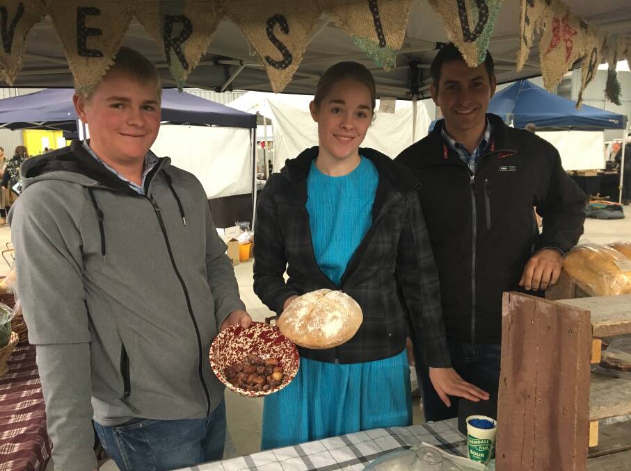 BAKE SALE: Marshall Eberly, Wendy and Lyndell Diller are part of the family that sells baked goods at the farmers market. Photo: ALEX CROWE
