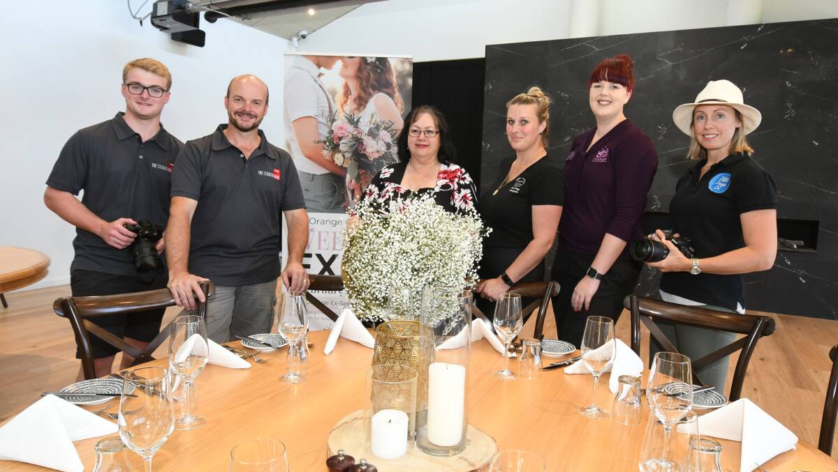 ON DISPLAY: Videographers David and Toby Smyth, Orange Ex-Services' Club event manager Tayla Harvey, florist Jane Hyde, florist and photographer Megan Woods and photographer Sarah Spagnolo. Photo: JUDE KEOGH