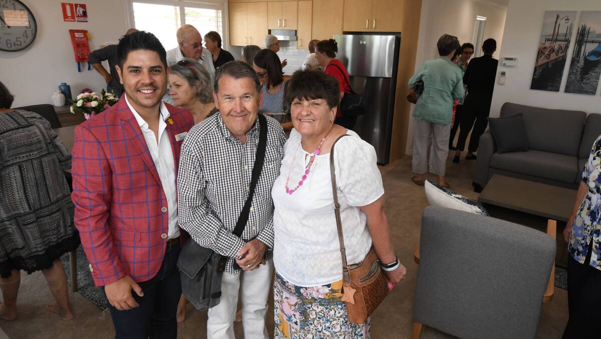 OPEN HOUSE: Cancer Council's Ricky Puata with Terry Smith and Lorraine Miller at the opening of the accommodation donated by Joan Smith. Photo: JUDE KEOGH 0227jkhouse1