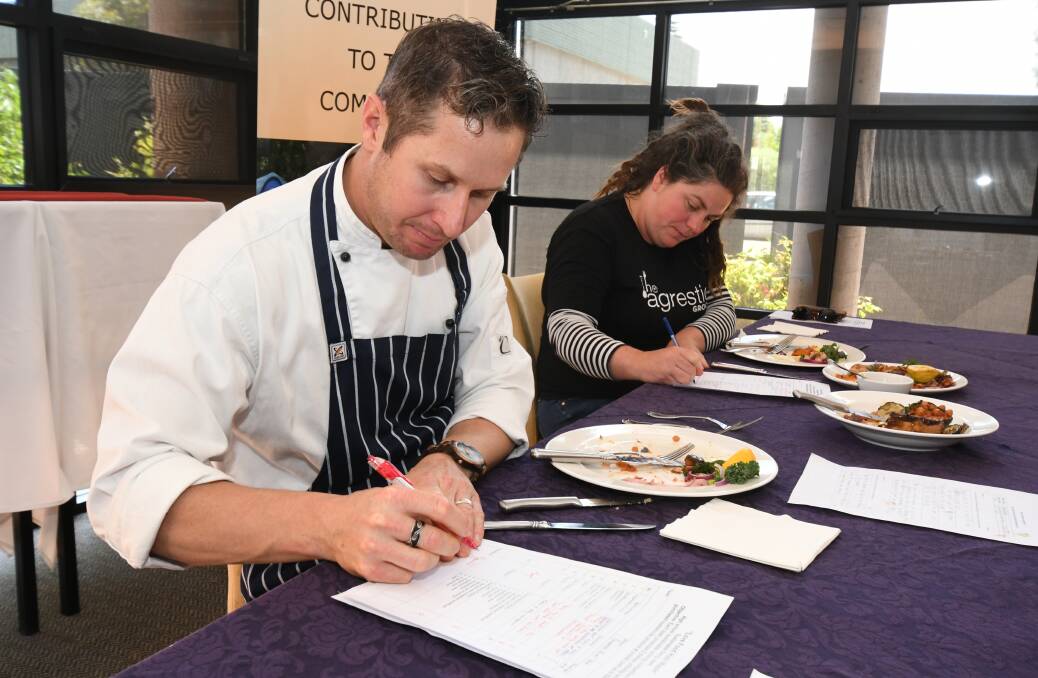 TOP DISH: Michael Apps and Danielle Martin judged the Orange Rotary's school cook-off on Friday. Photo: JUDE KEOGH 1109jkcookin1