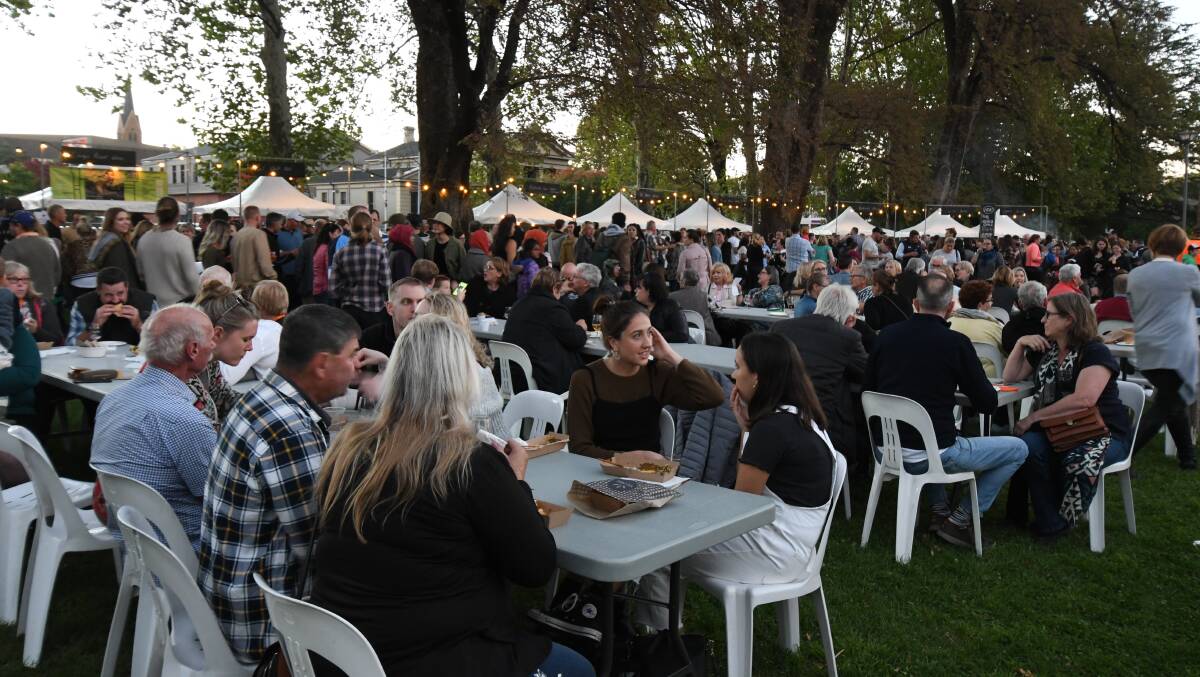 IN THE MARKET: There were thousands of people in Robertson park for the 2019 Orange FOOD Week Night Market. Photo: JUDE KEOGH