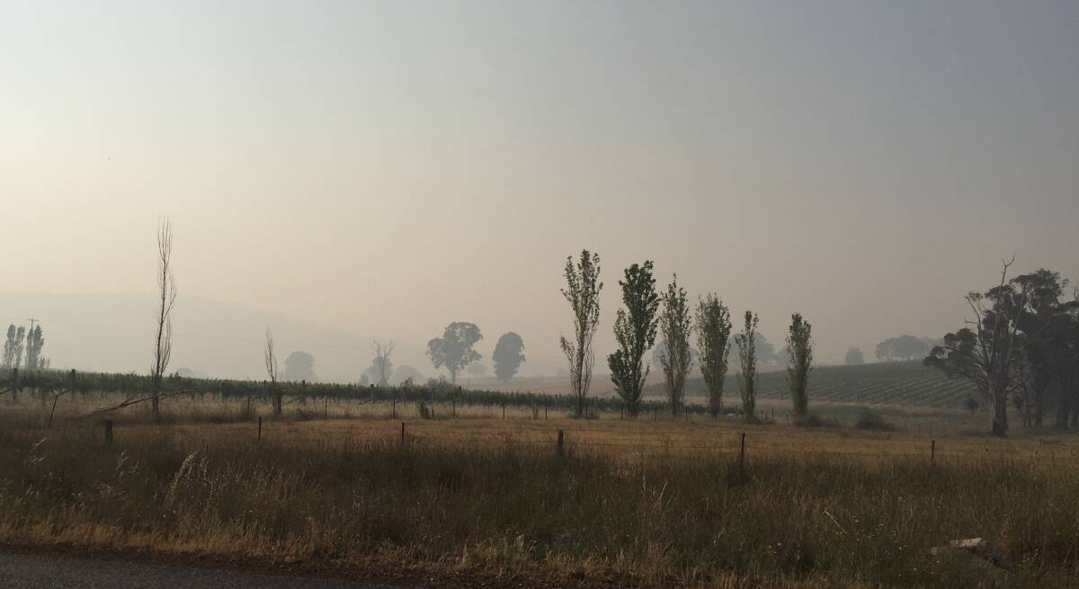 FIRE DANGER: Orange residents have choked on hazardous quality air for 16 days this month, including 11 in a row up to Boxing Day. Photo: JUDE KEOGH