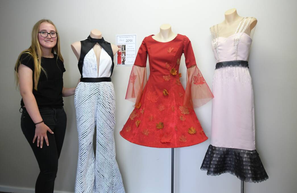 SHOW STOPPER: Year 12 Sophie Weeks with her 1970s inspired jumpsuit ahead of the HSC Major Works Exhibition. Photo: JUDE KEOGH 1119jktextiles1