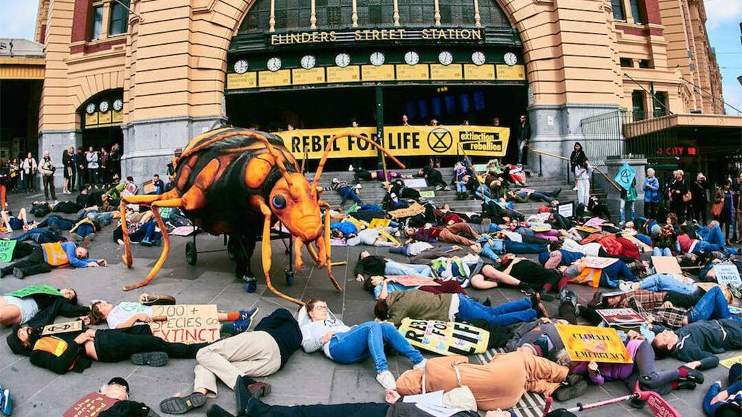 Extinction Rebellion activists stage a 'die in' at Flinders Street Station. Photo: SUPPLIED