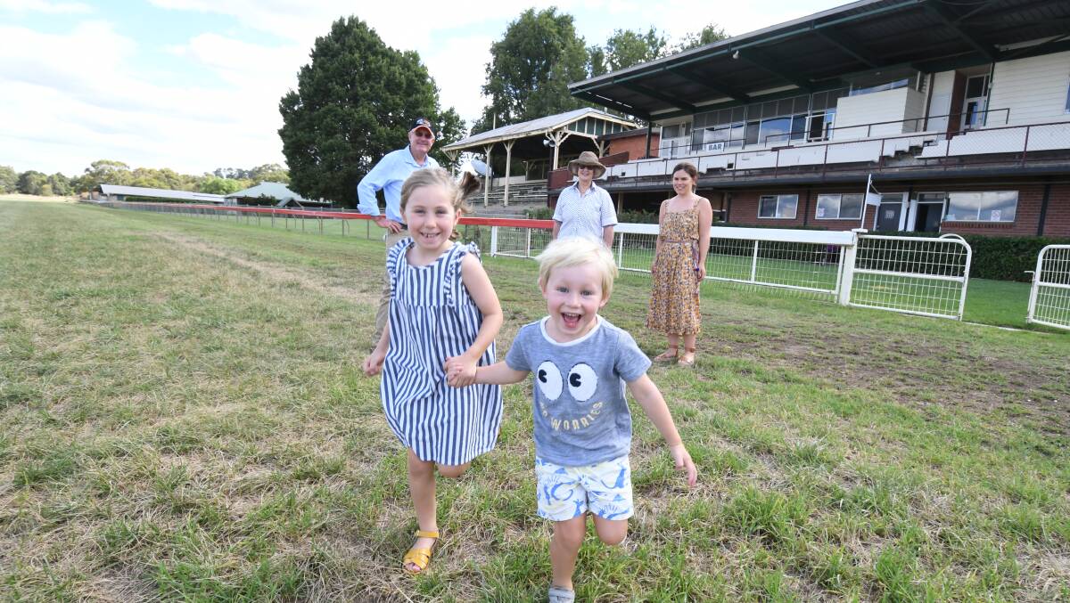 CUP CARNIVAL: Frank, Elaine and Abbey McRae, Maggie and Alby McRae gear up for the family race day at Towac park. Photo: JUDE KEOGH 0206jktowac1