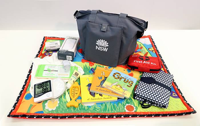 TAKE HOME: The pack includes books, sleeping bag, face cloth, baby wipes and resources on child development and parental well-being. Photo: NSW GOVERNMENT