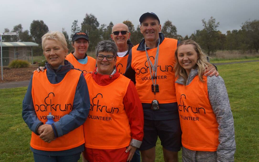 VOLLY SUPPORT: Brad Simmons is the time keeper amongst the volunteers for the launch of parkrun two years ago. Photo: Orange parkrun