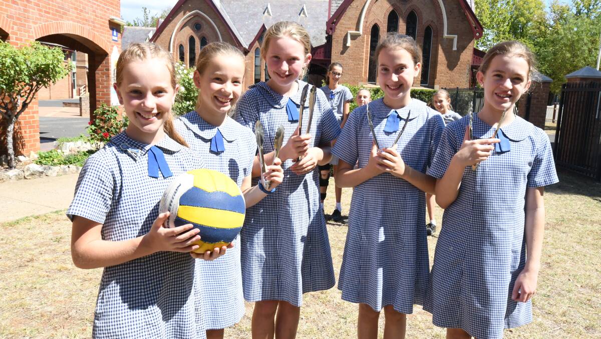 FUN RAISER: Orange Public School students Gabby Gregory, Emily Clunas, Xanthe Huxtable, Emily Vanstone and Ayanna Hope will help raise money for the school netball club on election day. Photo: JUDE KEOGH