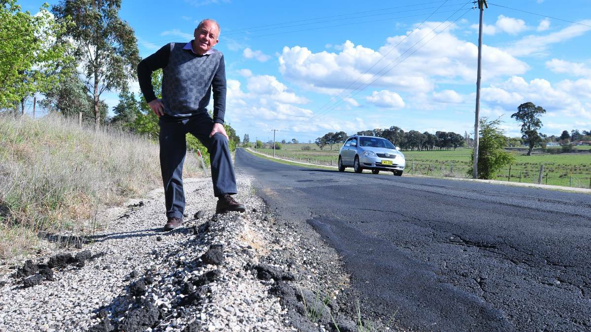 ROAD TOLL: Councillor Russell Turner said over the years a lot of money has been spent constructing Orange's network of roads, kerbs and gutters. Photo: JUDE KEOGH