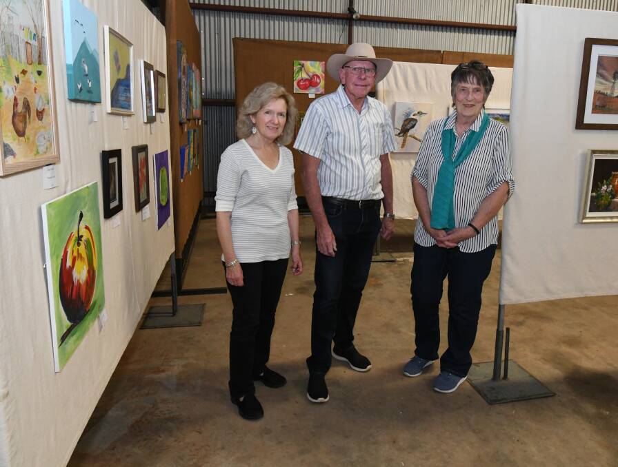 ON SHOW: Glen Southwood, Tony Kennedy and Kaye Partridge will be onsite at Borenore for the Rural Art Competition and sale. Photo: JUDE KEOGH 1024jkart1