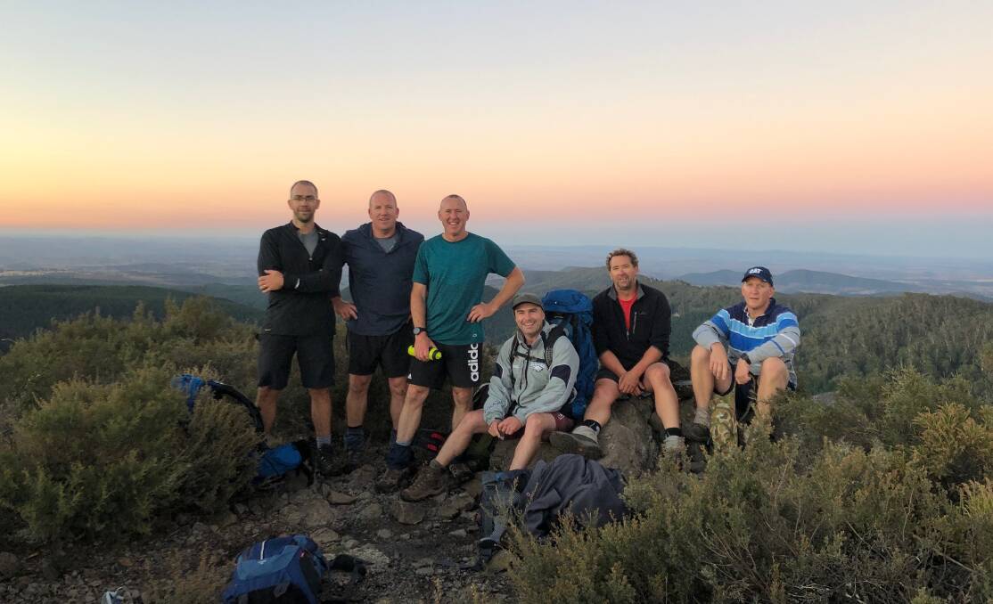 READY TO WALK: Nick Gray, Phil Wilkin, Craig Jaques, Mark Johnston, Craig Smith and Brendan Rouse on one of their many training walks in the Mount Canobolas State Conservation Area. Absent: Murray and Jack Evans and Sebastian Jones. Photo: RICHARD VENNER