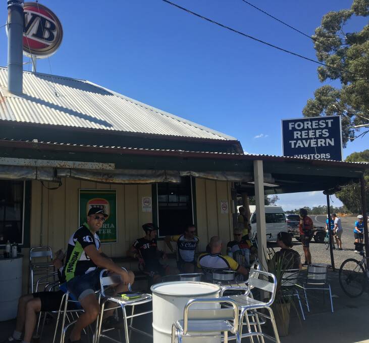 BEER BREAK: Thirsty cyclists enroute to Orange.