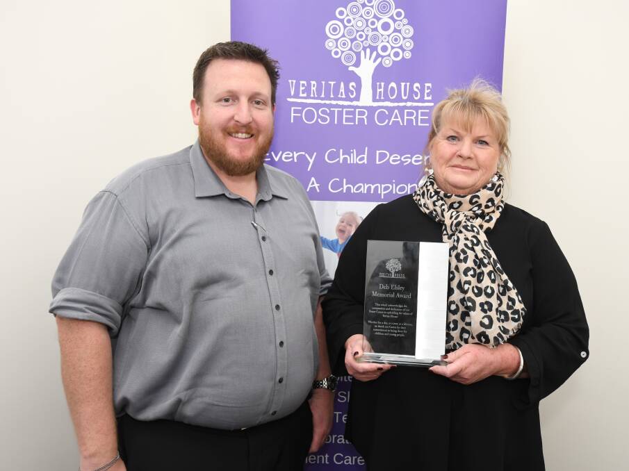 SUPER MUM: Veritas House Operations Manager Joel Palmer with Deb Elsley Memorial Award recipient Di Fenner who has fostered 40 children over 15 years. Photo: JUDE KEOGH