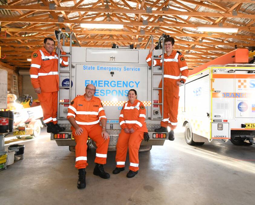 SES SUPPORT: Nation called on to don the colour of the SES to support volunteers like Grant Hill, Rob Stevens, Toni McDonald, Callum Cope. Photo: JUDE KEOGH 0516jkses1