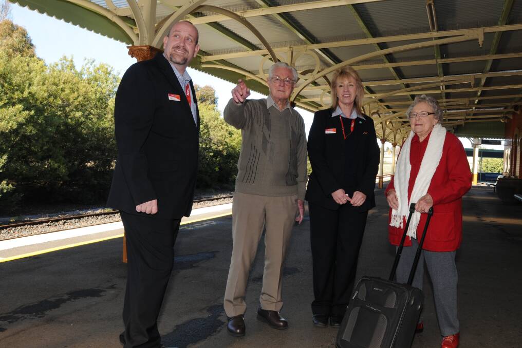 RAIL'S WAY BACK TO THE PAST: Station manager Mick Herft, Tom Hogan, senior customer attendent Margaret Kennedy and Joan Heffer. Photo: STEVE GOSCH