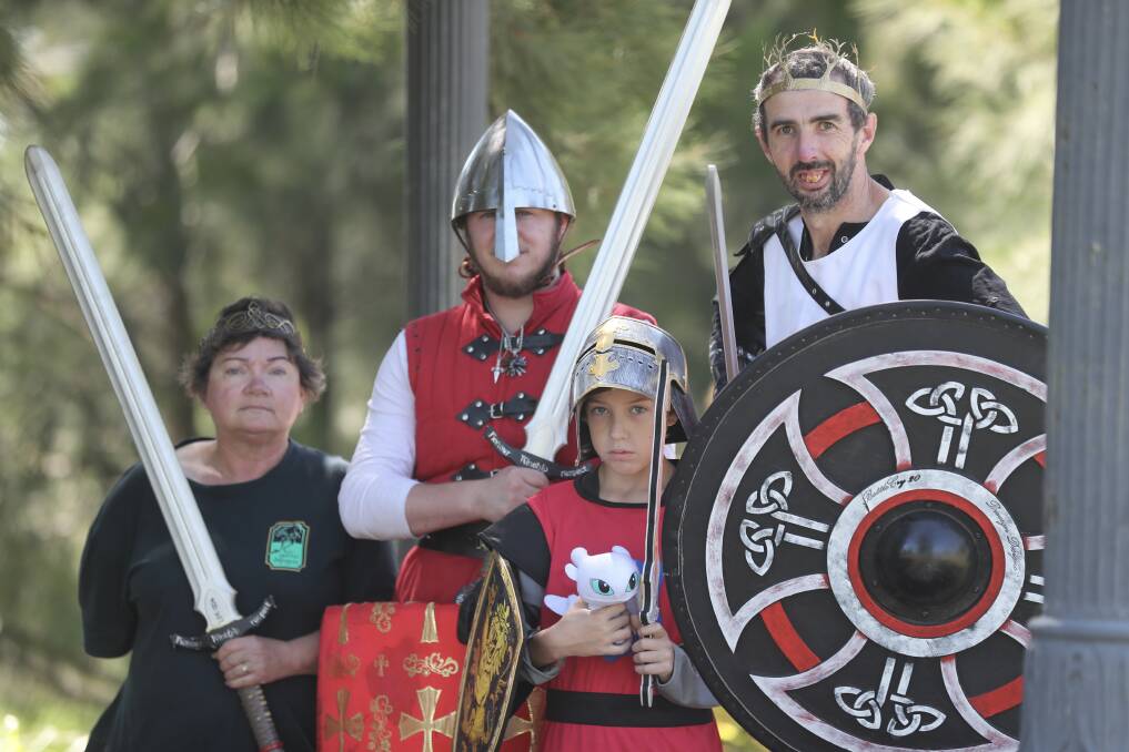 Tracey Denton-Seymour, Justin Alexander, Cooper McCabe-Jenner and Cary Jenner with swords and shields. Picture by Phil Blatch