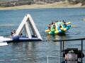People climbing on the inflatable equipment at Bathurst Aqua Park in February, 2024. Picture by James Arrow