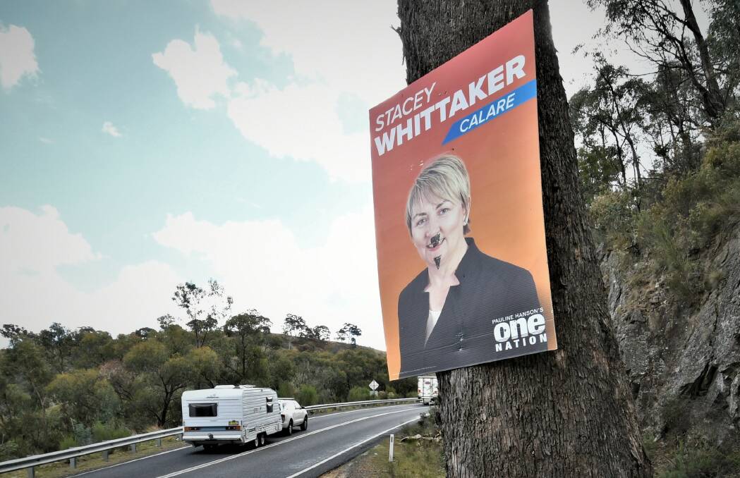 DISRESPECTFUL: One Nation candidate Stacey Whittaker has had some of her campaign signs defaced. Photo: CHRIS SEABROOK