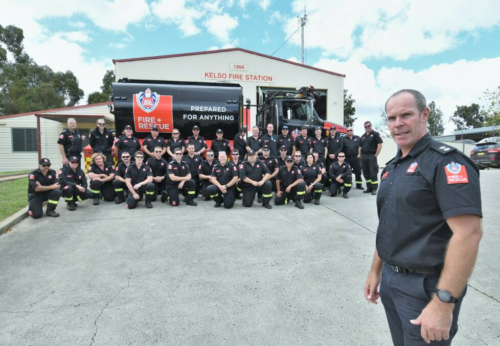 HELP ON THE WAY: NSW Fire and Rescue acting Superintendent Tim Climo with the firefighters going to Port Macquarie. Photo: CHRIS SEABROOK 032421convoy1