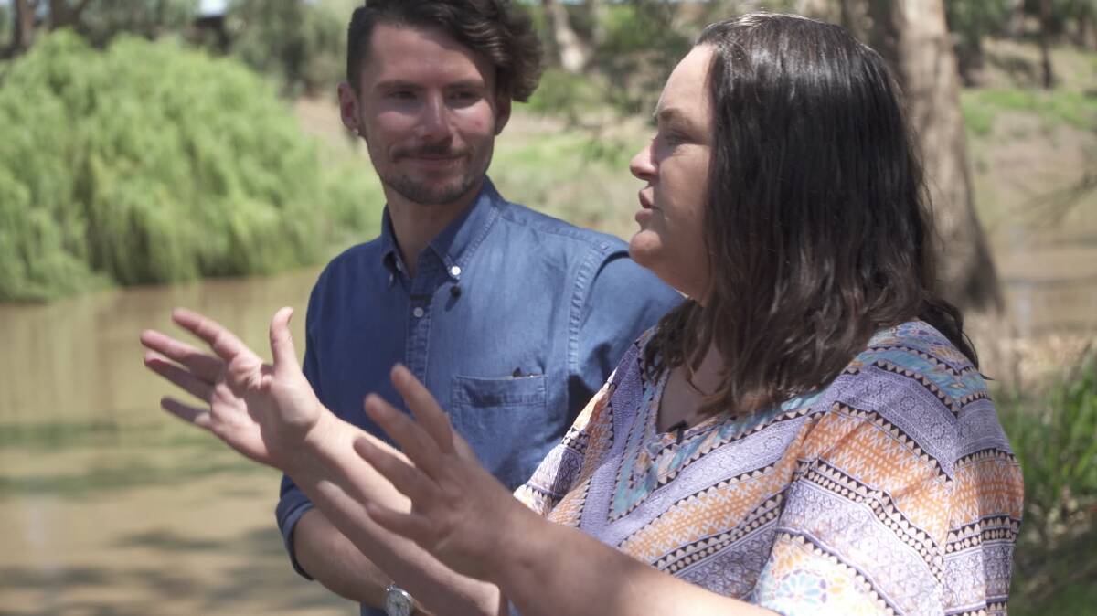 Filmmaker Jed Coppa having a chat with Dubbo Healthy Rivers Ambassador Mel Gray down at Terramungamine. Photo: SUPPLIED 