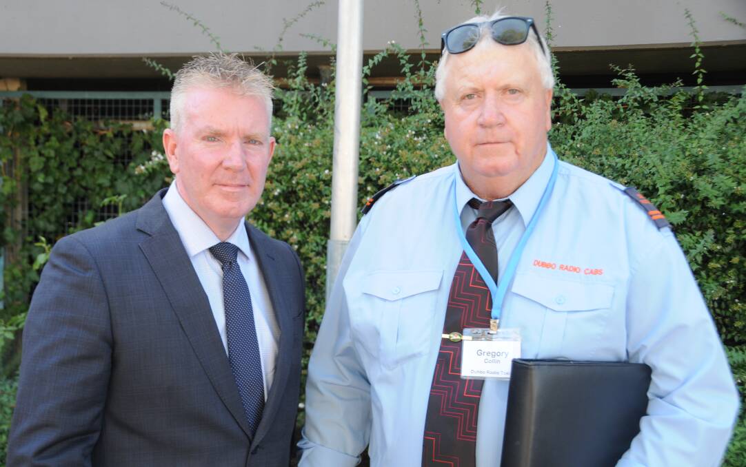 Hard times: NSW Taxi Council president Martin Rogers, here with Central West cab owner Greg Collin, has told of the desperate situation taxi owners find themselves in.