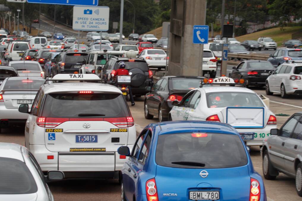 Gridlock: Failures in transport planning In Sydney and Melbourne have resulted in massive daily congestion. Photo: Quentin Jones