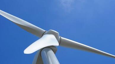 Wind farm body says dragging debate will delay power price drops