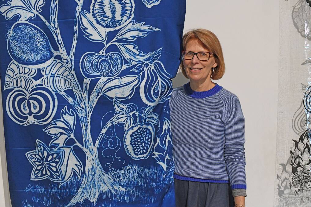 EXHIBIT OPEN: Pauline Griffiths with her unique artwork, working with shapes and fruit in a challenging type of print-making. PHOTO: PROVIDED. 