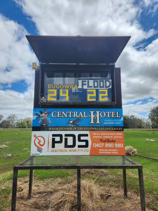 Andrew Barnes changed the scoreboard at Eugowra's rugby league ground to reflect the town's spirit. Picture supplied 