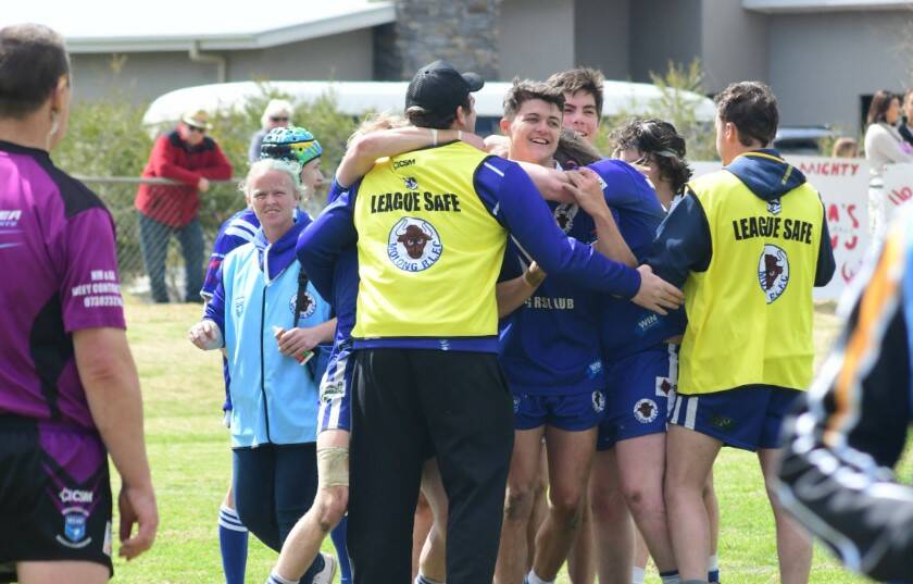 Molong celebrate their grand final victory. Picture by Jude Keogh 