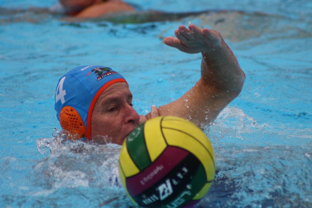 EYE ON THE BALL: Jets' Matt Forsyth reaches for the ball as he fouls his opponent. Photo: MEGE HOUGHTON